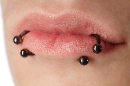 double lip piercing bite piercing