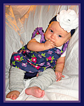 Scarlett models baby leggings and flower clip/headband.