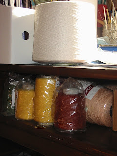 white bamboo cone, red and yellow cottolin cones, peach carpet warp cones