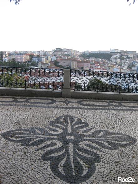 [miradouro+sao+pedro+alcantara+art+history+pavement+portuguese+artistic+guide+portuguese++lisbon+tour+portugal+city++roc2c+detail+cross+limestone+black+white.JPG]
