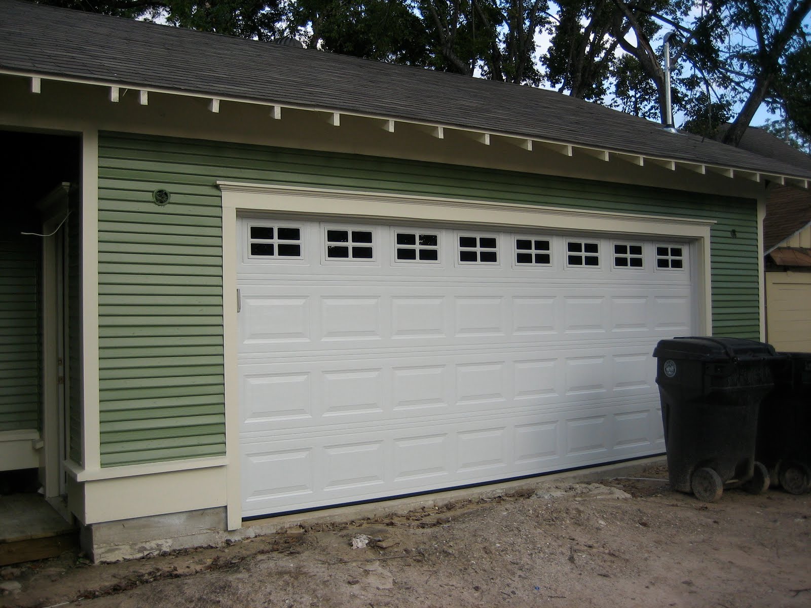 730 Omar Renovation Trim Garage Door Are Done