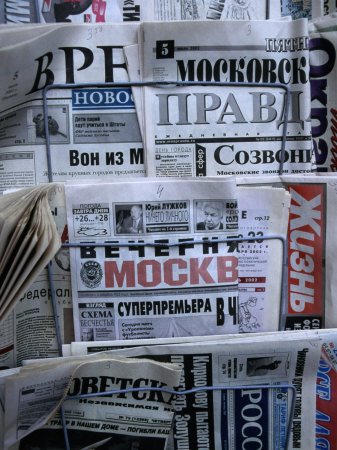 [BN15067_19-FB~Russian-Newspapers-Including-Pravda-and-Moscow-Evening-News-at-Newsstand-Moscow-Russia-Posters.jpg]