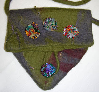 felt purse by Una, beaded button by Una, beaded buttons by students