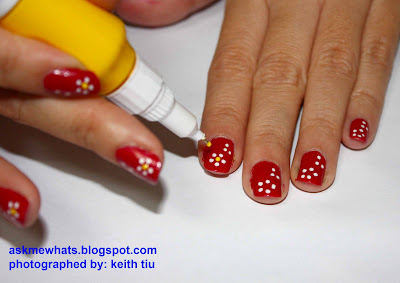 Using a yellow nail polish pen (or any bright color pen), create a BUD on Using a yellow nail polish pen (or any bright color pen), create a BUD on