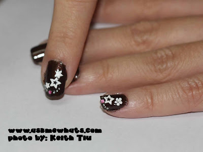 You can top the nail art designs with glittery polish