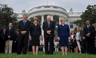 President George W. Bush, Mrs. Laura Bush, Vice President Dick Cheney and Mrs. Lynne Cheney bow their heads for a moment of silence on the South Lawn of the White House Tuesday, Sept. 11, 2007, in memory of those whose lives were lost on Sept. 11, 2001. White House photo by Chris Greenberg.