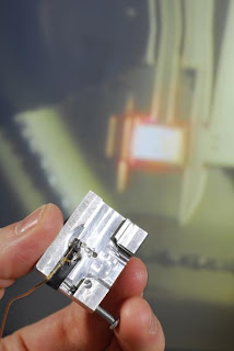 An AFM holder adapted so that the FIRAT probe can be used on existing AFM systems