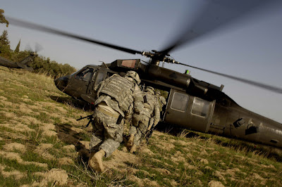 U.S. Army Soldiers move to the UH-60 Black Hawk after searching the area for items of interest during an aerial response force mission, Iraq, March 31. Soldiers are assigned to the 1st Platoon, Alpha Company, 2nd Battalion, 35th Infantry Regiment, Schofield Barracks, Hawaii. U.S. Air Force photo by Master Sgt. Andy Dunaway.
