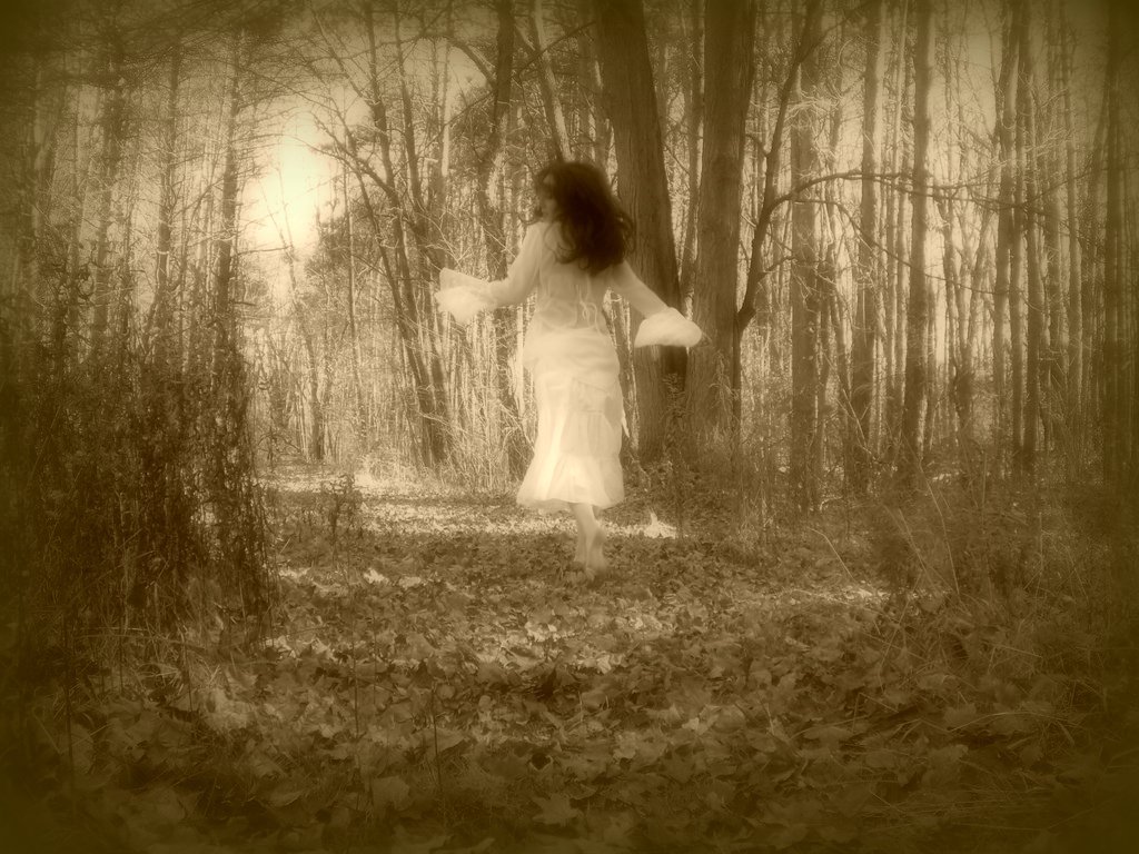 [lady+running+down+the+forest+path+hair+flying+head+slightly+looking+back.jpg]
