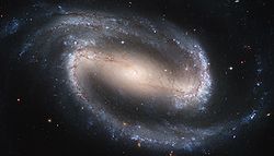 [250px-Hubble2005-01-barred-spiral-galaxy-NGC1300.jpg]