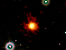 This image merges data from Swift's Ultraviolet/Optical (blue, green) and X-Ray (orange, red) telescopes.