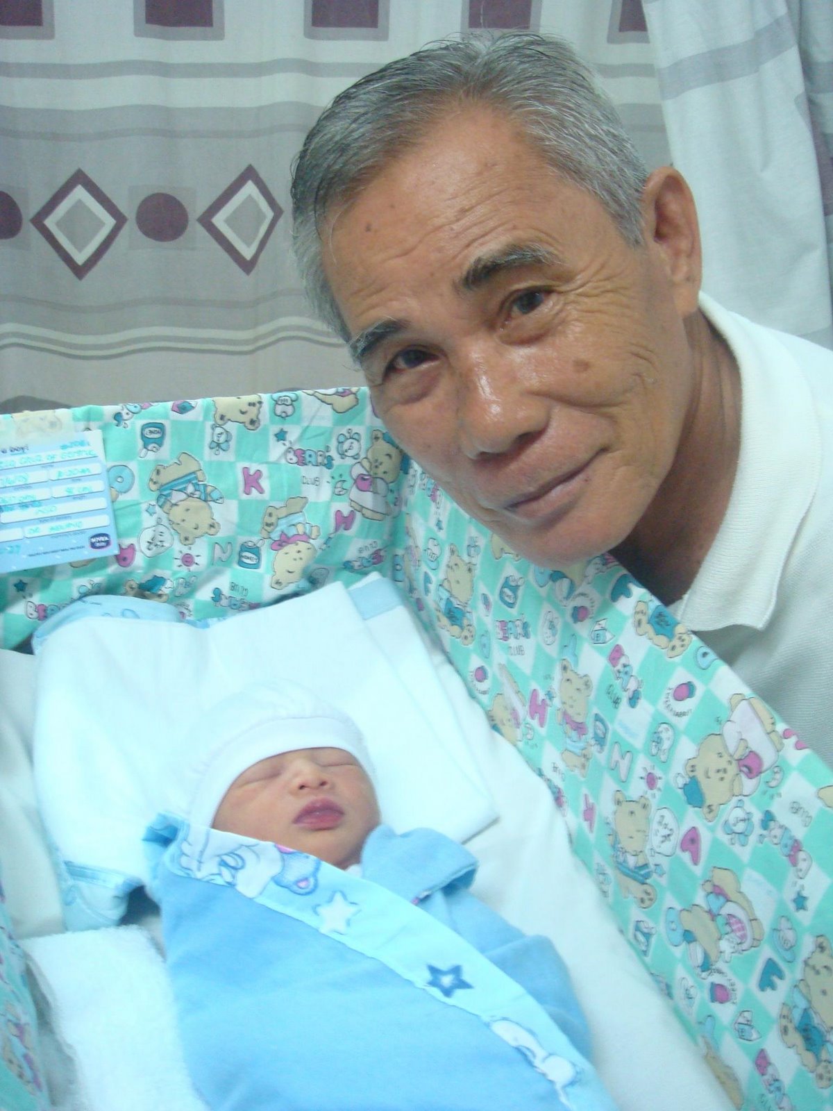 [miguel+with+lolo+papi.jpg]