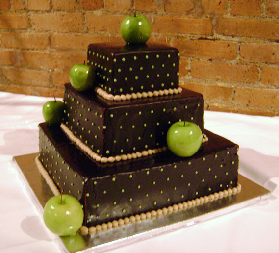 Wedding cakes featuring lush green apples as the main decorative element