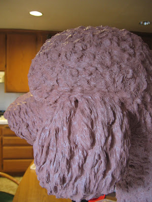 3-4 layers of clay, Final detail is applied to clay poodle 