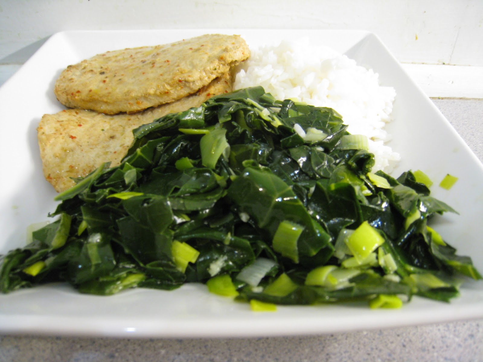 Vegan by the Bay Collard greens with leeks and garlic over jasmine rice