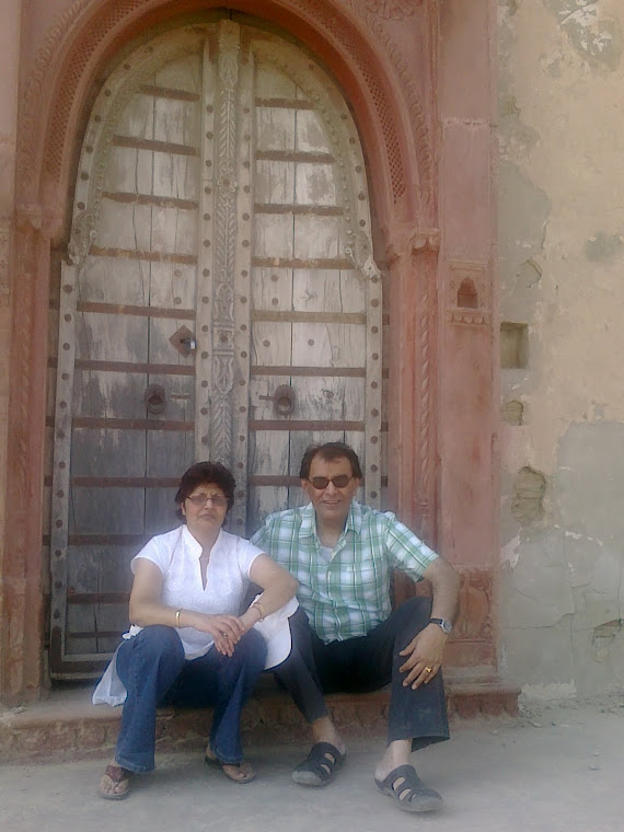 Mrs & Mr 'P' sitting on the doorstep of our ancestral home in "PUGAL" Village