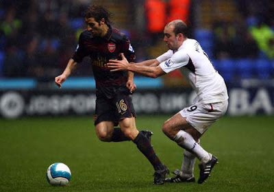 Gavin McCann of Bolton Wanderers and Mathieu Flamini of Arsenal