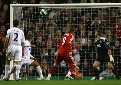 Liverpool striker Fernando Torres scores the second goal of the match