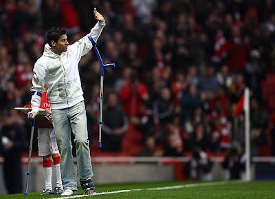 Eduardo da Silva of Arsenal is applauded by the crowd just before kickoff at the Emirates Stadium. The Croatian striker suffered a horrific leg break a few weeks ago and will attempt to make a comeback many months from now.