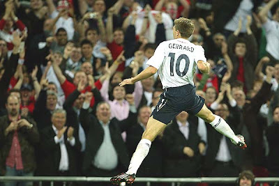 Steven Gerrard of England celebrates as he scores the second goal.