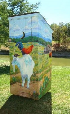 goat painted on an outhouse