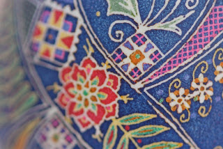 Goose Egg Pysanky with Orange Poppies and Peacocks on Cobalt Blue Background