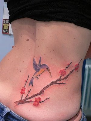 Lower Back Female Tattoo