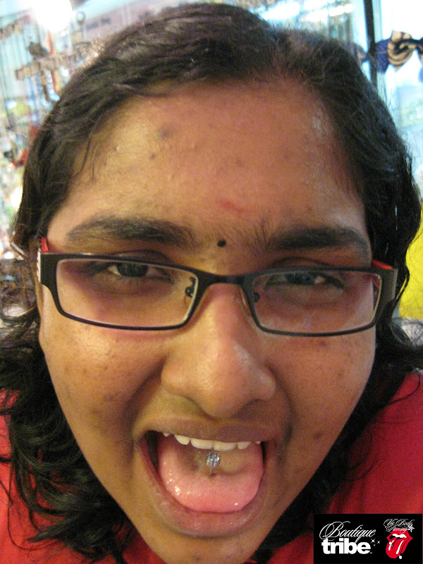 Tongue piercing title=