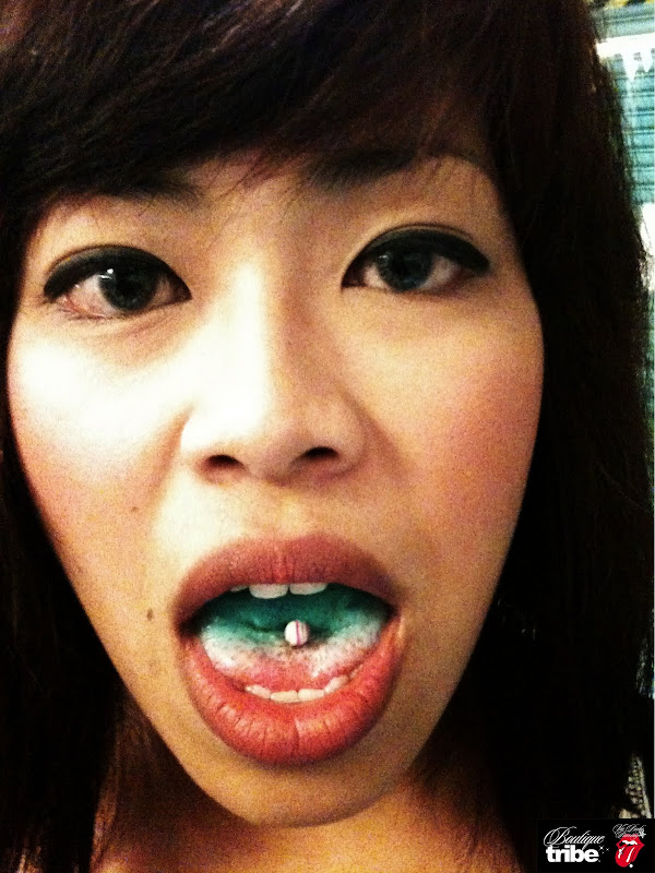 Tongue piercing title=