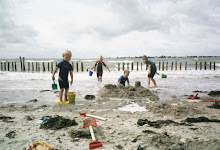 Boys on whittering beach