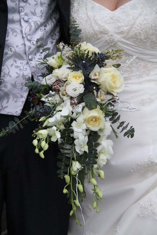  form a gentle plume of loveliness in this cascade wedding bouquet 