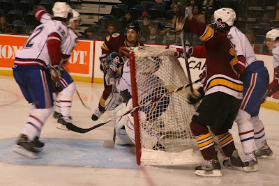Credit: Jane Rickarda bit of 2nd period action at the Hamilton goal, Deins in goal