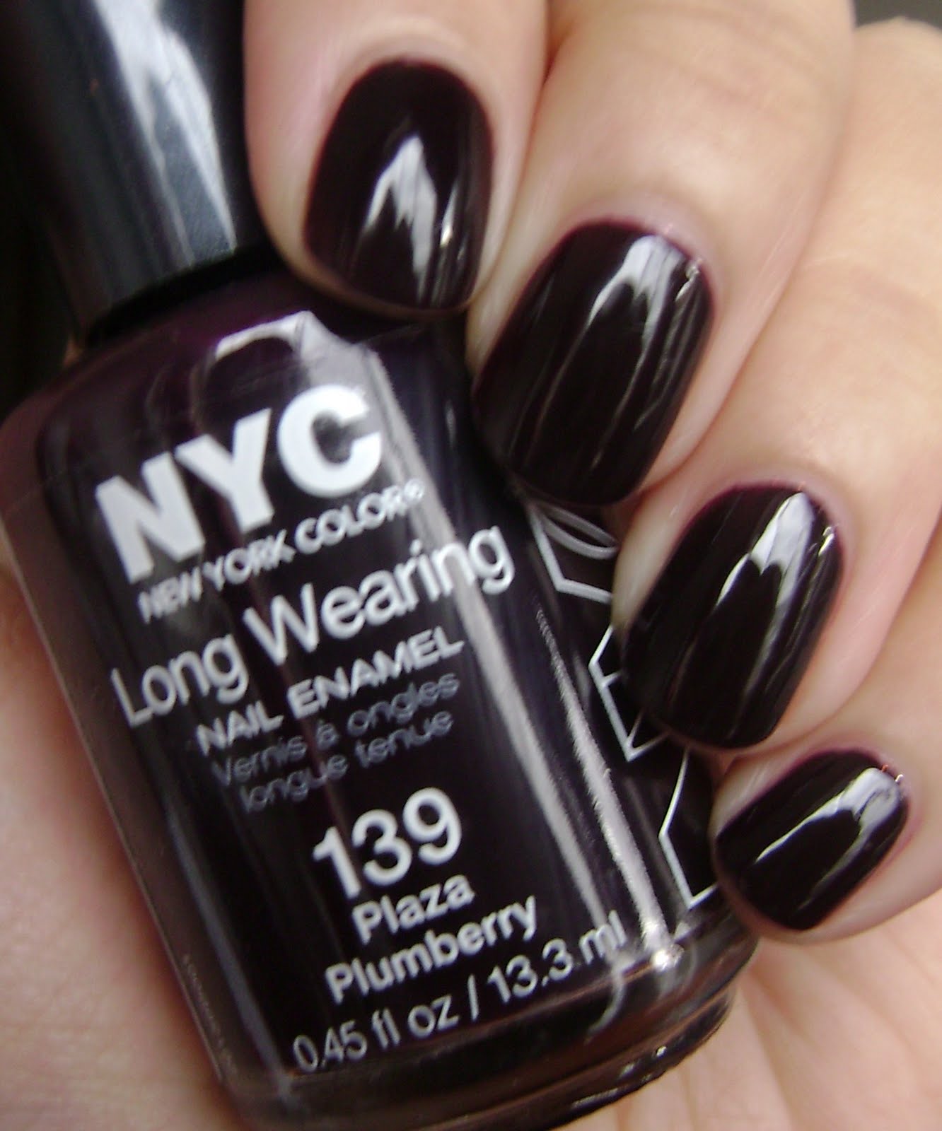 I like this shade -- looks black, but just barely plum-tinged