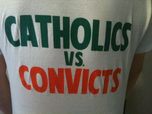  '88 Miami game T-shirts “Catholics vs. Convicts—Unfinished Business.”