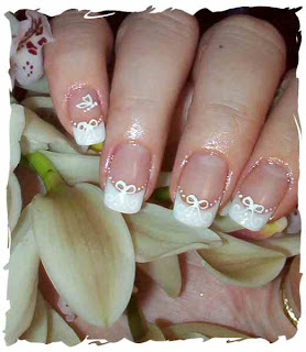 http://4.bp.blogspot.com/_VG9uyc-aJtw/SAiZaYCUTmI/AAAAAAAAAck/r-oLy0ODoak/s320/wedding%2Bnail%2Bart%2Bbows%2Band%2Bbutterfly.jpg