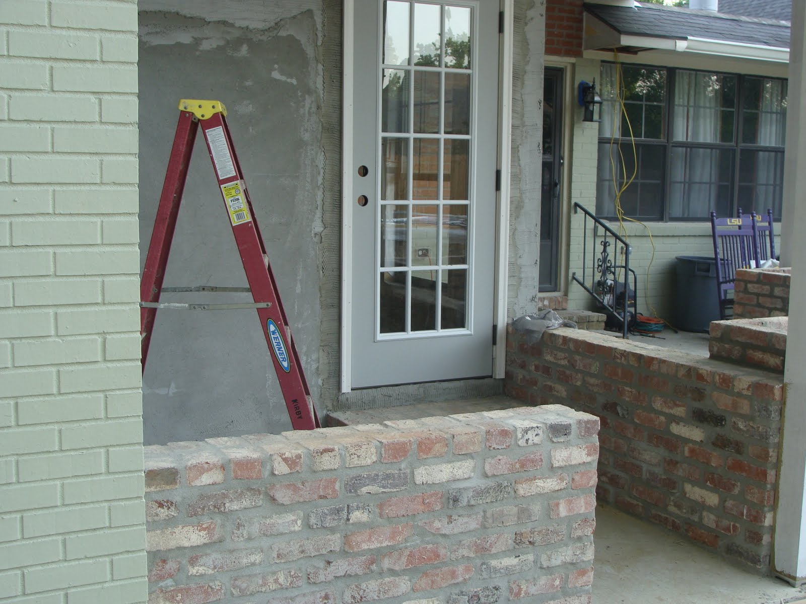 The Ross' Painted brick, outdoor kitchen, backdoor...YEAH!