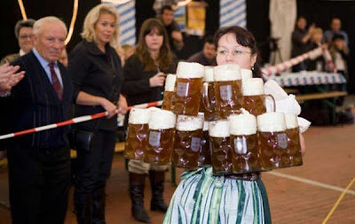 Most-beer-steins-carried-over-40-meters-female-600x379.jpg