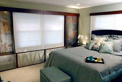 Storm passions remain outside the threshold of the bedroom - everything here breathes calm and appeasement. Deep shades of gray and blue, smooth texture and the original lighting created a sense of cool water.