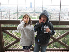 Eating Eiffel Tower lollies on the Eiffel Tower