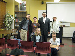 A photograph of Benzion, Noranne, Ari, Rachel, Melanie, and Justin