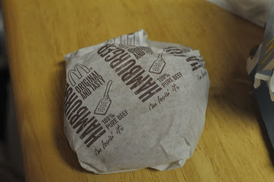 McDonald's Hamburger in its wrapper