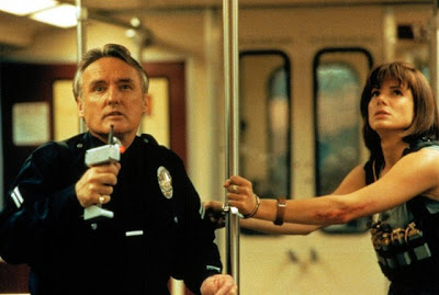 Dennis Hopper y Sandra Bullock en Speed (1994)