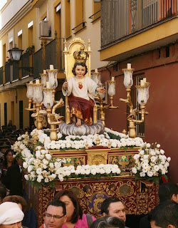 Religious procession in sevilla or Seville, barrio of Triana Religious procession in sevilla or Seville, barrio of Triana