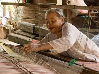 weaver at her loom