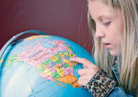 NAMC montessori us history thanksgiving activities girl with globe