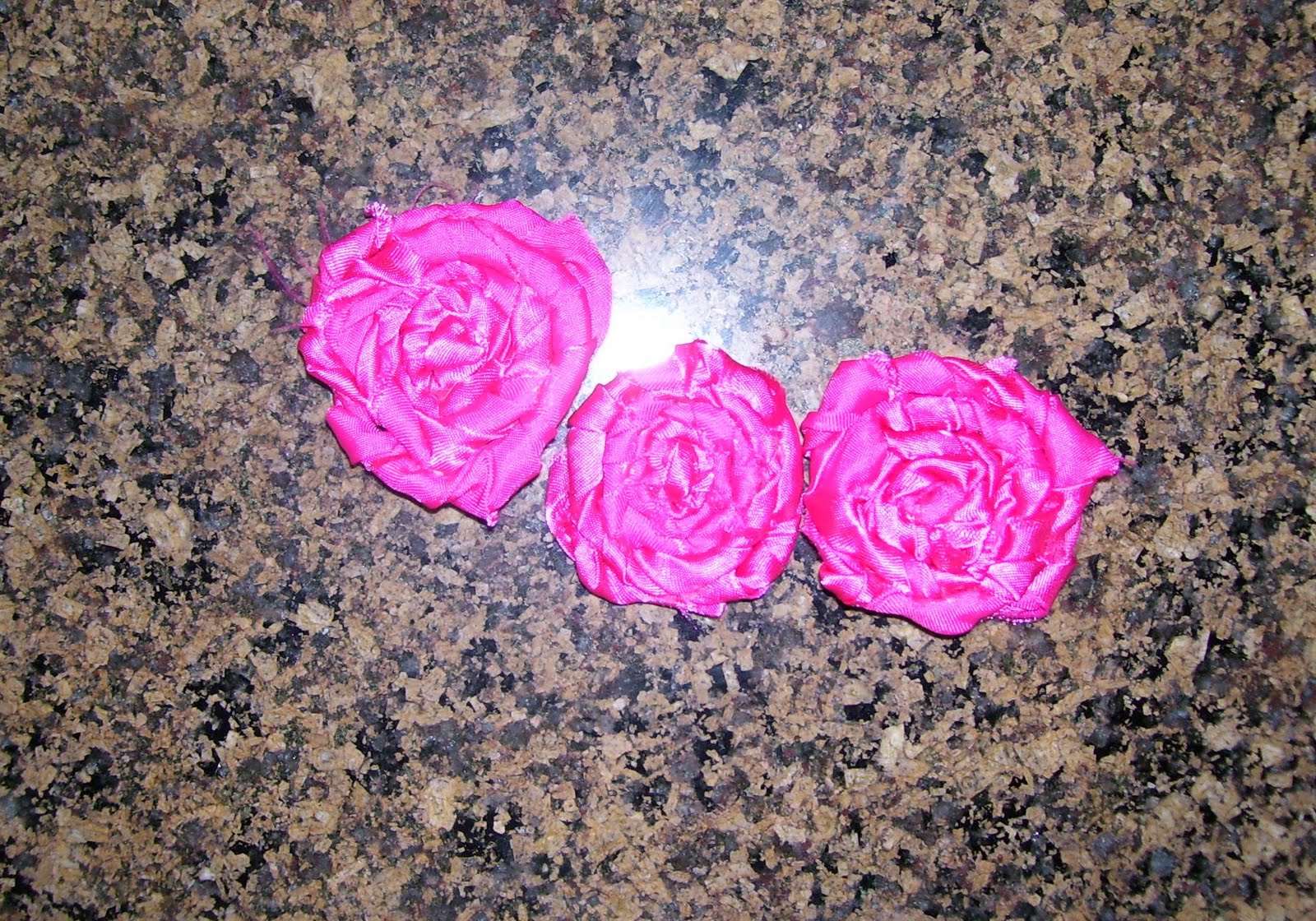 A Lil Bird told me... Rolled fabric roses and a bit about me...