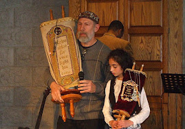 Natali with Rabbi Moshe and the Torah Scrolls