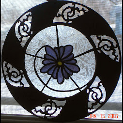 Stove pipe guard with stained glass iinsert