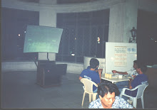 "Closed circuit telivision" for cockfighters in the restaurant lobby of Rolligon Stadium.