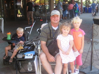 Ellie and Emma with artist Roland Lee during the quick draw event